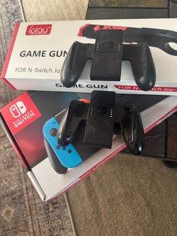 Nintendo switch, game gun, remotes, game