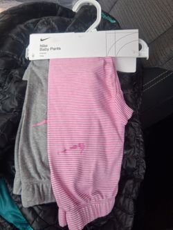 New 2 pairs baby girl Nike sweats (6 mo's)