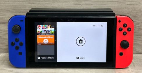 NINTENDO SWITCH HAC-001 - 32GB - W/ REDBLUE JOYCON AND CHARGER (PO1017613)