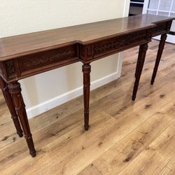 Ornate carved wood console table – elegant hall/office piece