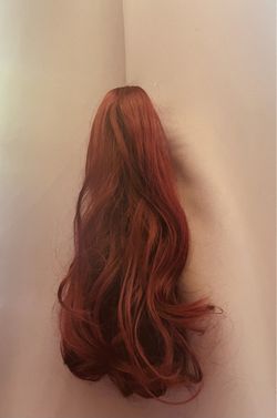 Clip in synthetic hair piece auburn