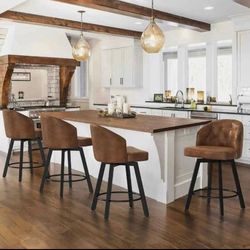 Set of 4  Barstools for kitchen island . New in box.  Swivel. Leather
