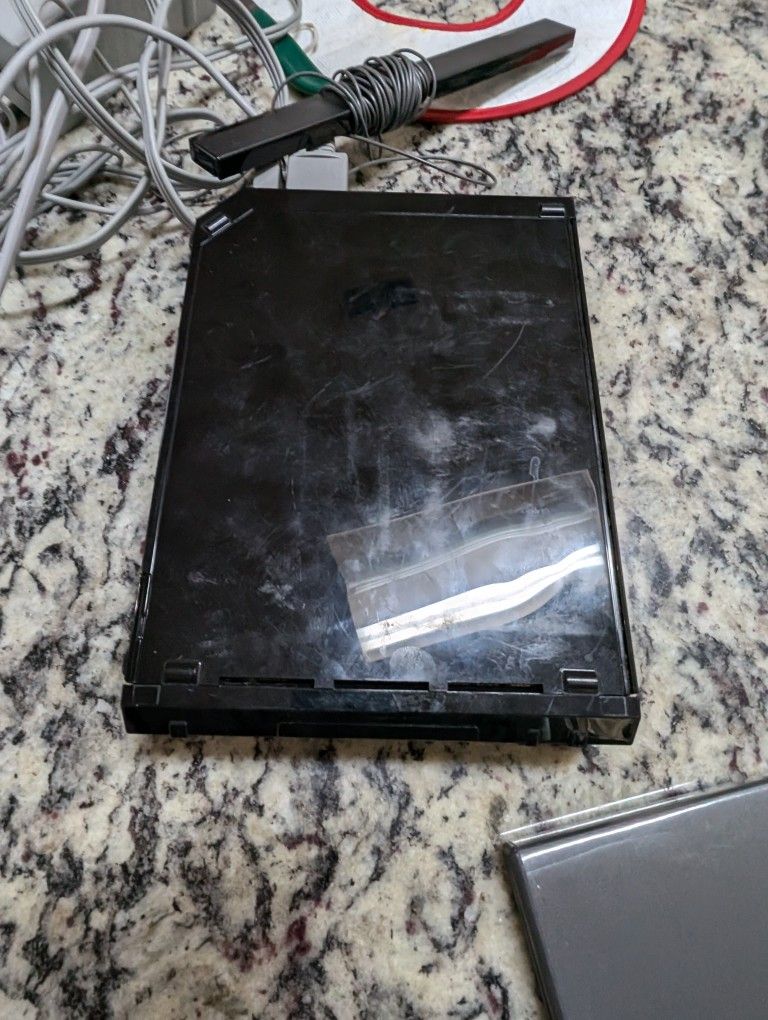 Wii console power on but not detecting games  as is