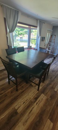 Mesa con 6 sillas y extension