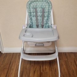 Like New Ingenuity Baby High Chair ( Foldable). Price Firm!