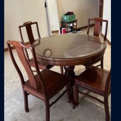 Dining table round four chairs glass top Rosewood