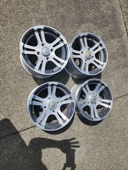 Arctic Cat aluminum ATV wheels.