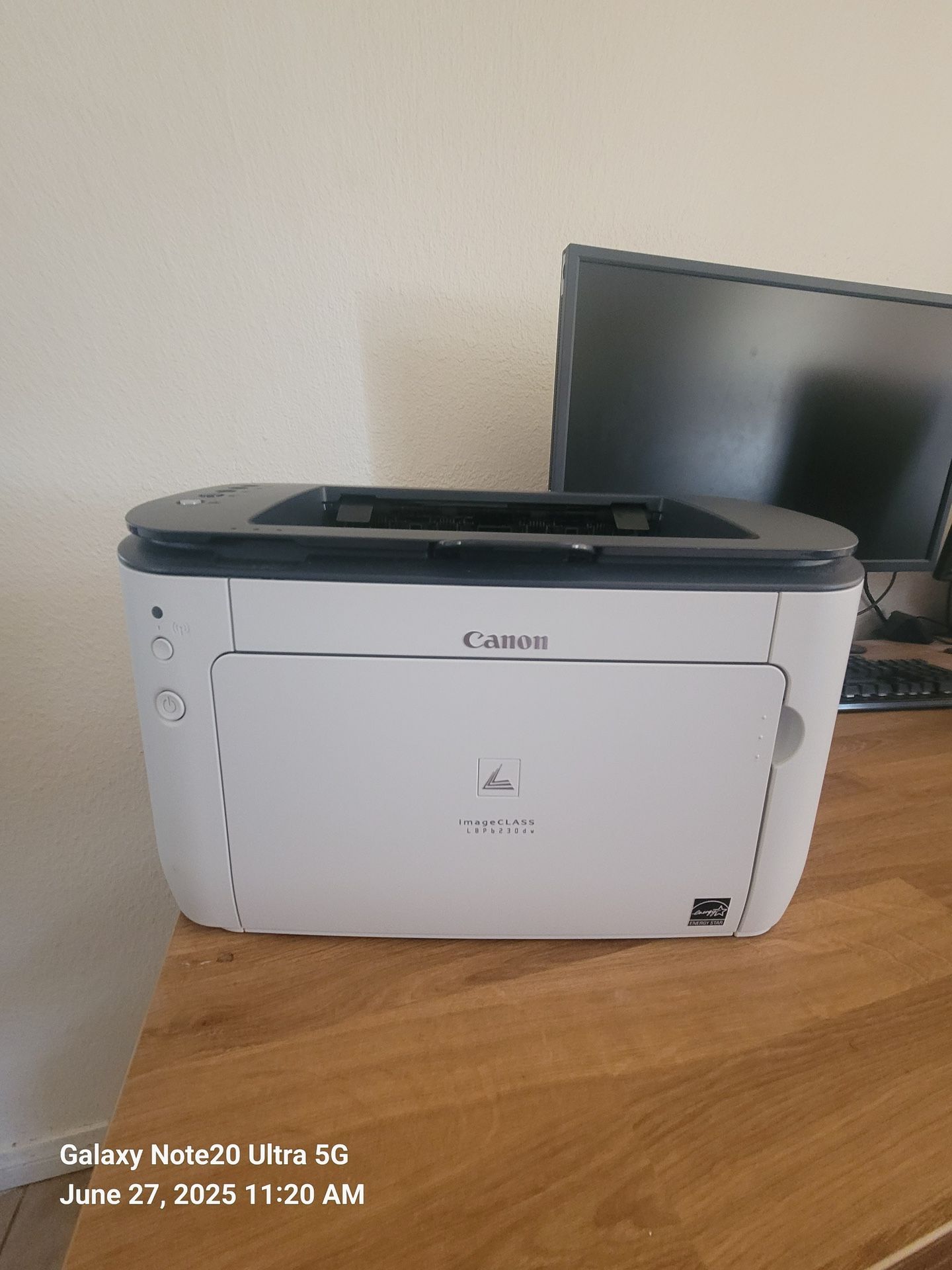 Canon imageCLASS LBP6230dn laser printer.