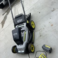 Ryobi Lawnmower With Charger And Battery 