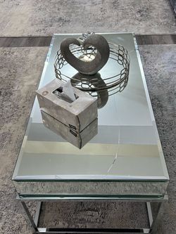 Table and mirror they have cracked on th