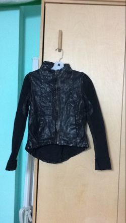 Improvd Leather Jacket converts to Vest. Size XS or 2. Zipper removable sleeves.