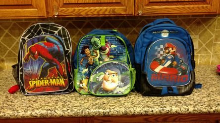 Boy backpacks