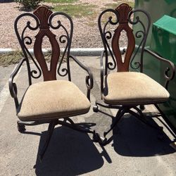 2 Swivel Rolling Brown Dinning Room Chairs 