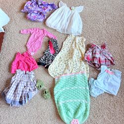 Giraffe changing pad and new born clothes $45