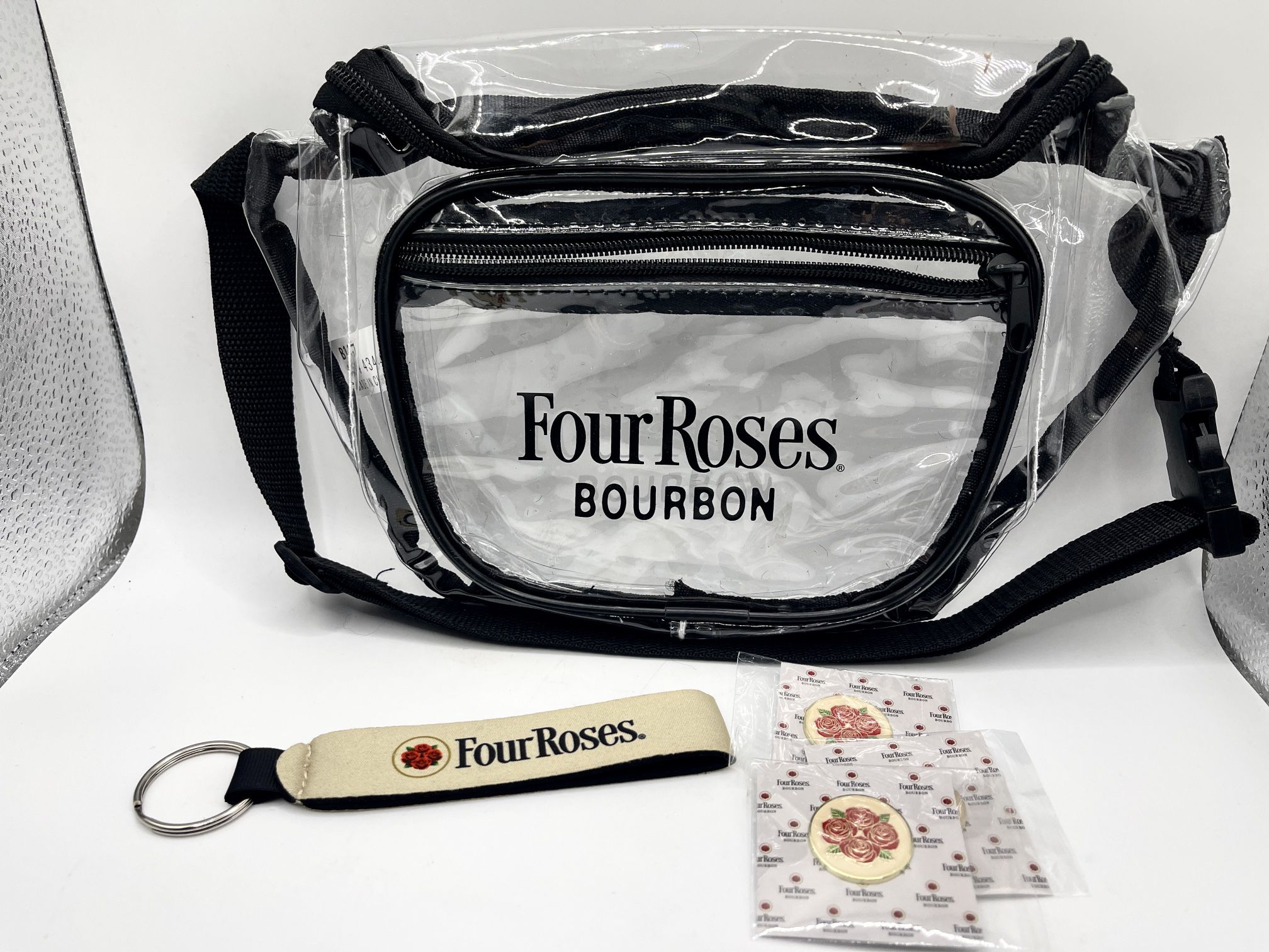 Vintage Four Roses Bourbon Clear Keychain & Badges