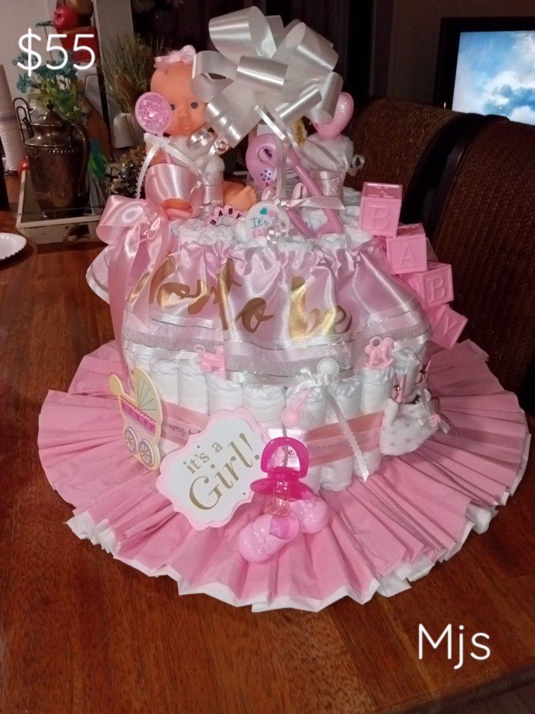Diaper Cakes And Gift Baskets Made To Order. 