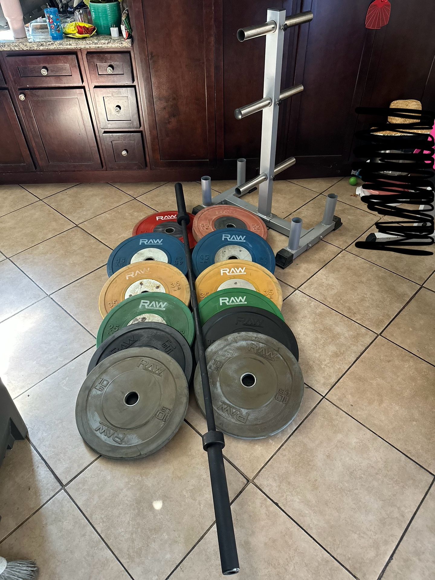 Olympic bumper competition weights 370lbs total plus 7ft bar and weights tree