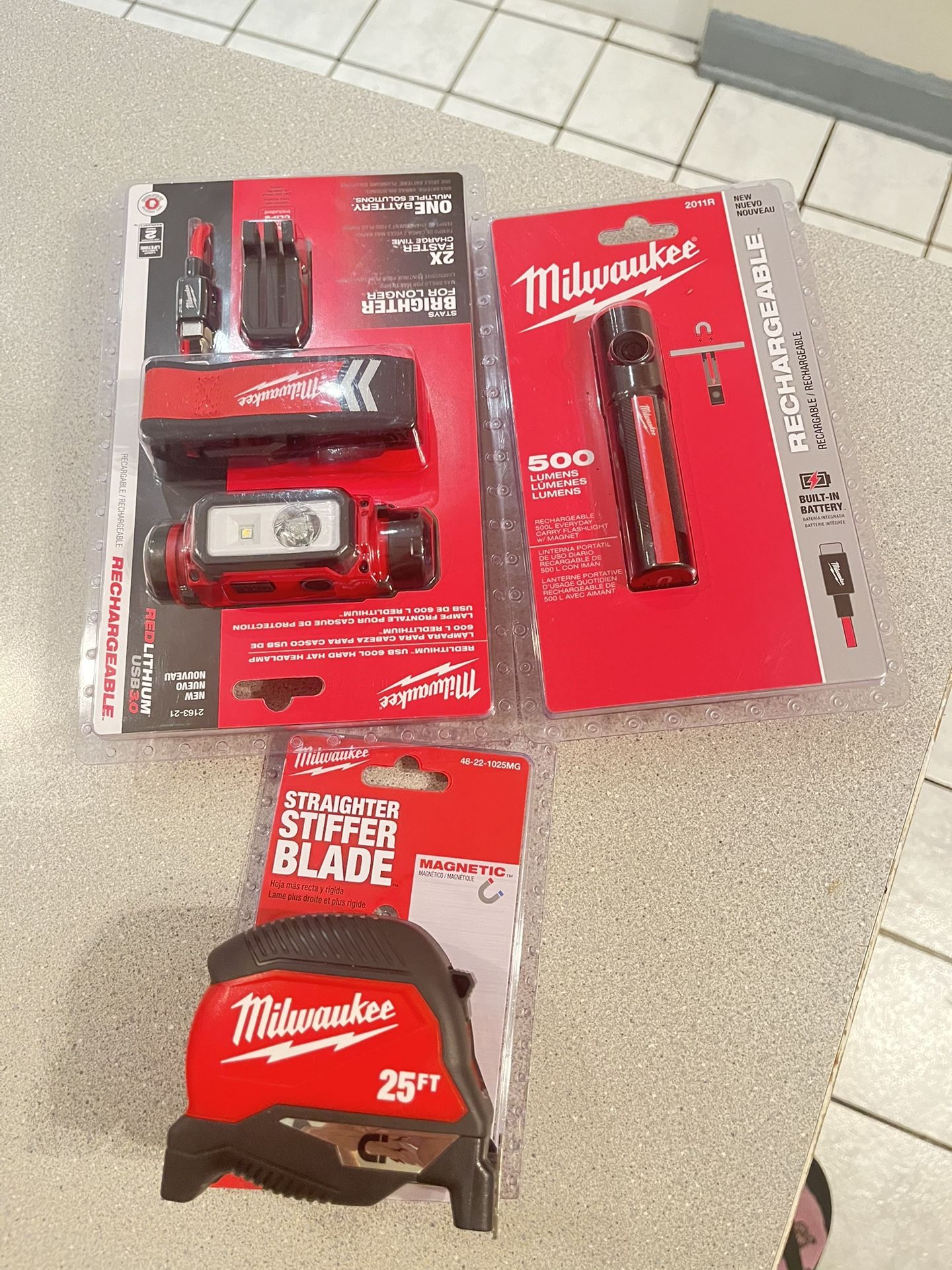 Milwaukee New Lights And Tape Measure All For $100