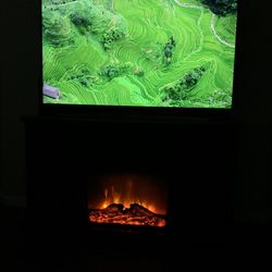 Samsung TV what TV stand fireplace what song bar and Apple TV