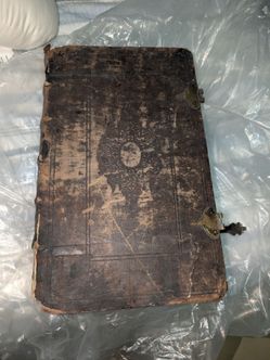 Antique 1715 edition of The Holy Bible with the Old and New Testaments.