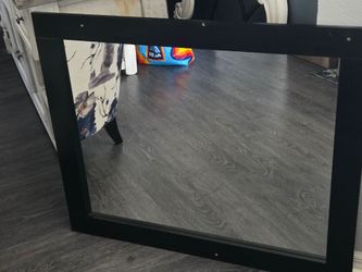 Wooden black framed mirror