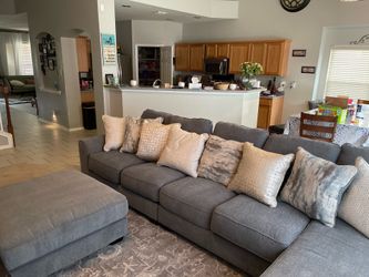 Ashley Furniture Castano Collection gray sectional couch