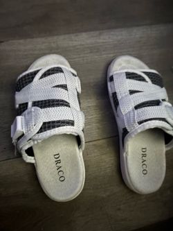 white and black reflective draco slides