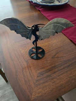 Dragon statue with metalic wings