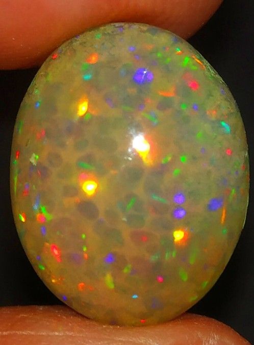 1.65 Cts. 1.65 Cts.  Ethiopian Opal Gemstone Oval Cabachone 