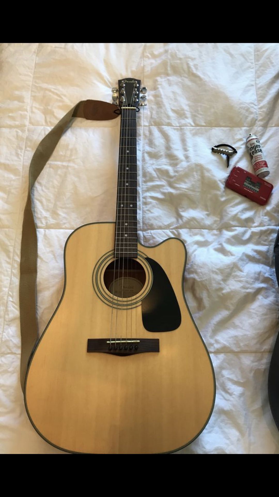 Fender acoustic electric guitar DG-10ce NAT with hard shell case, tuner, and more.