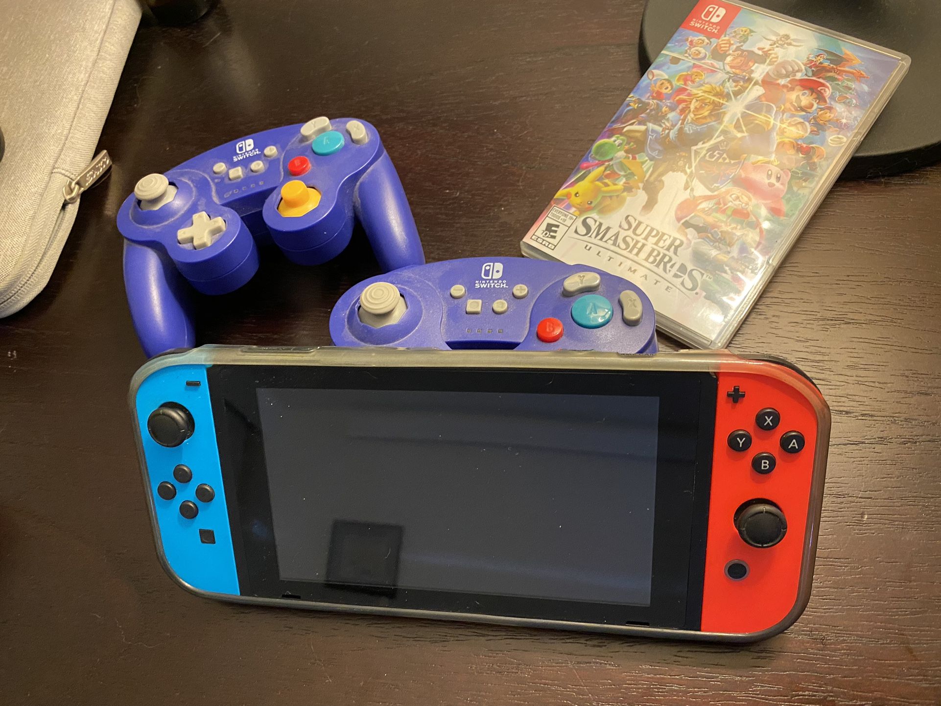 Nintendo switch with game cube controllers And smash Bros 