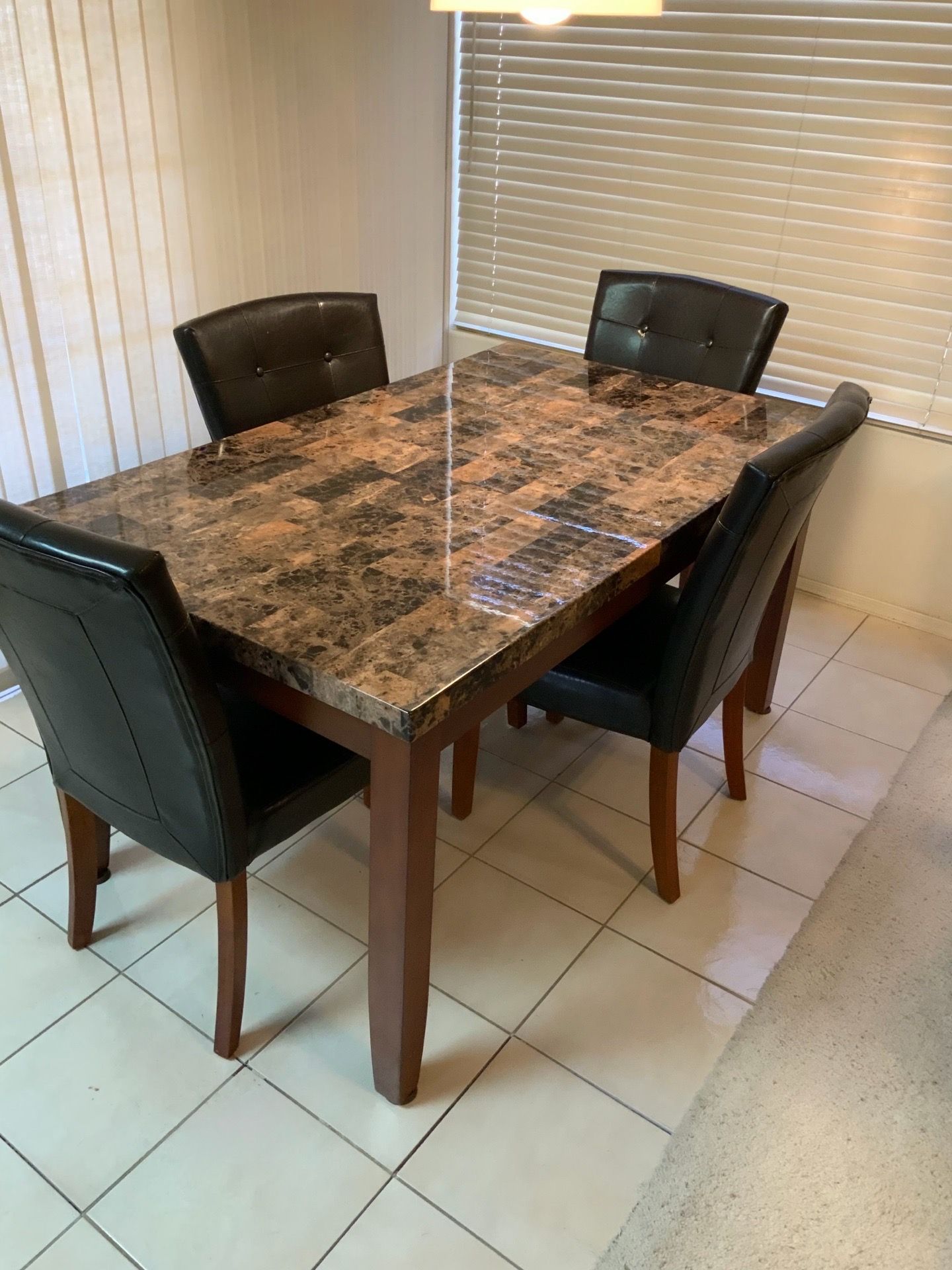 Table with 4 Leather like Chairs
