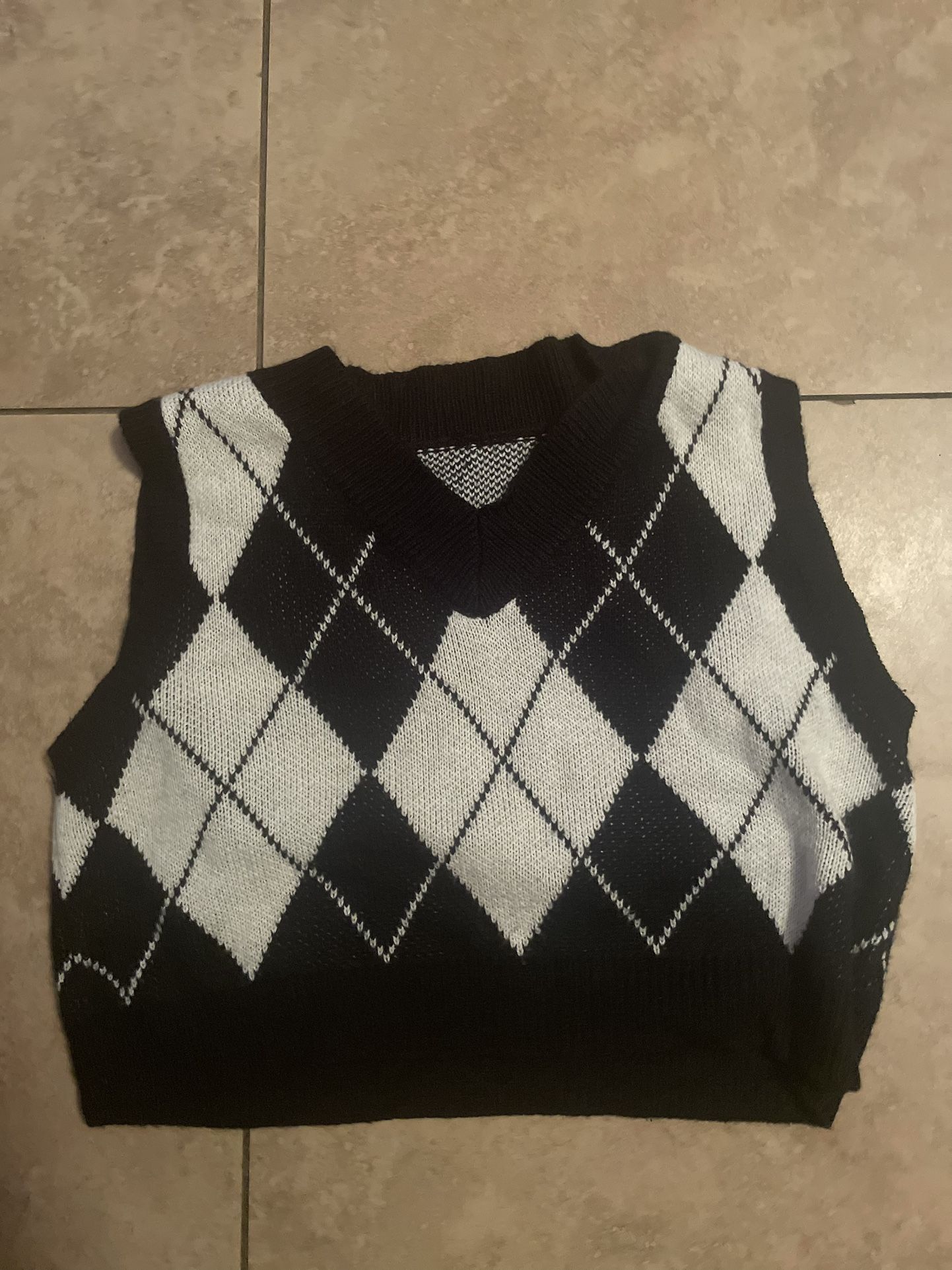 Black and white patterned vest
