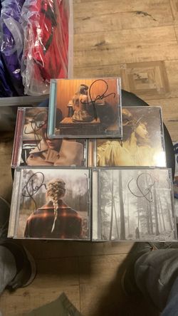 Tyler swift selection of signed CDs