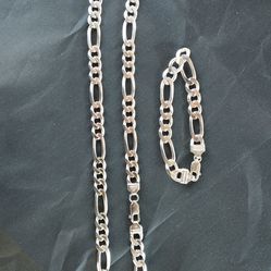 silver Figaro chain and bracelet