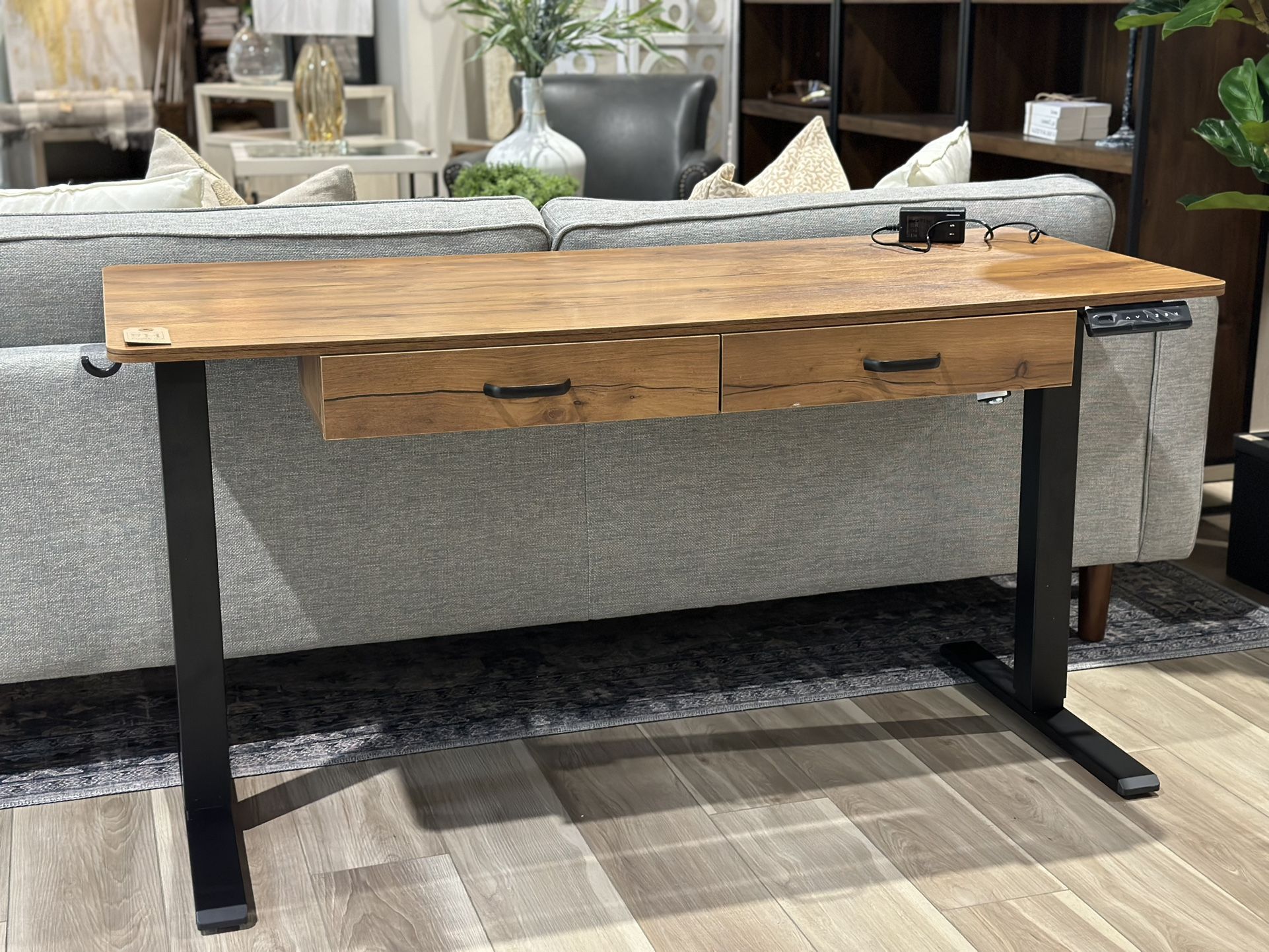 Adjustable Bratchell Desk. Manufactured wood. 29.5" H x 55" W x 24" D. MSRP $340. Our price $189 + sales tax