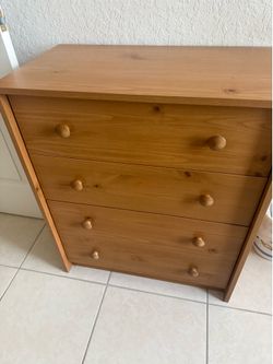 4 drawer chest in light wood