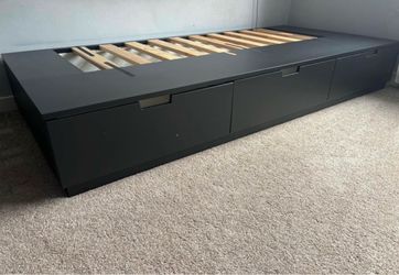 Moving out - queen NORDLI Bed frame with storage and mattress, anthracite/Valevåg firm. Queen