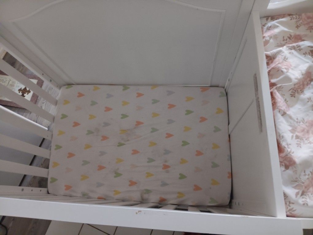 Baby Crib With A Changing Table