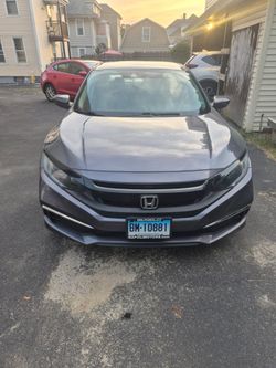 Honda civic 2019 color gris.