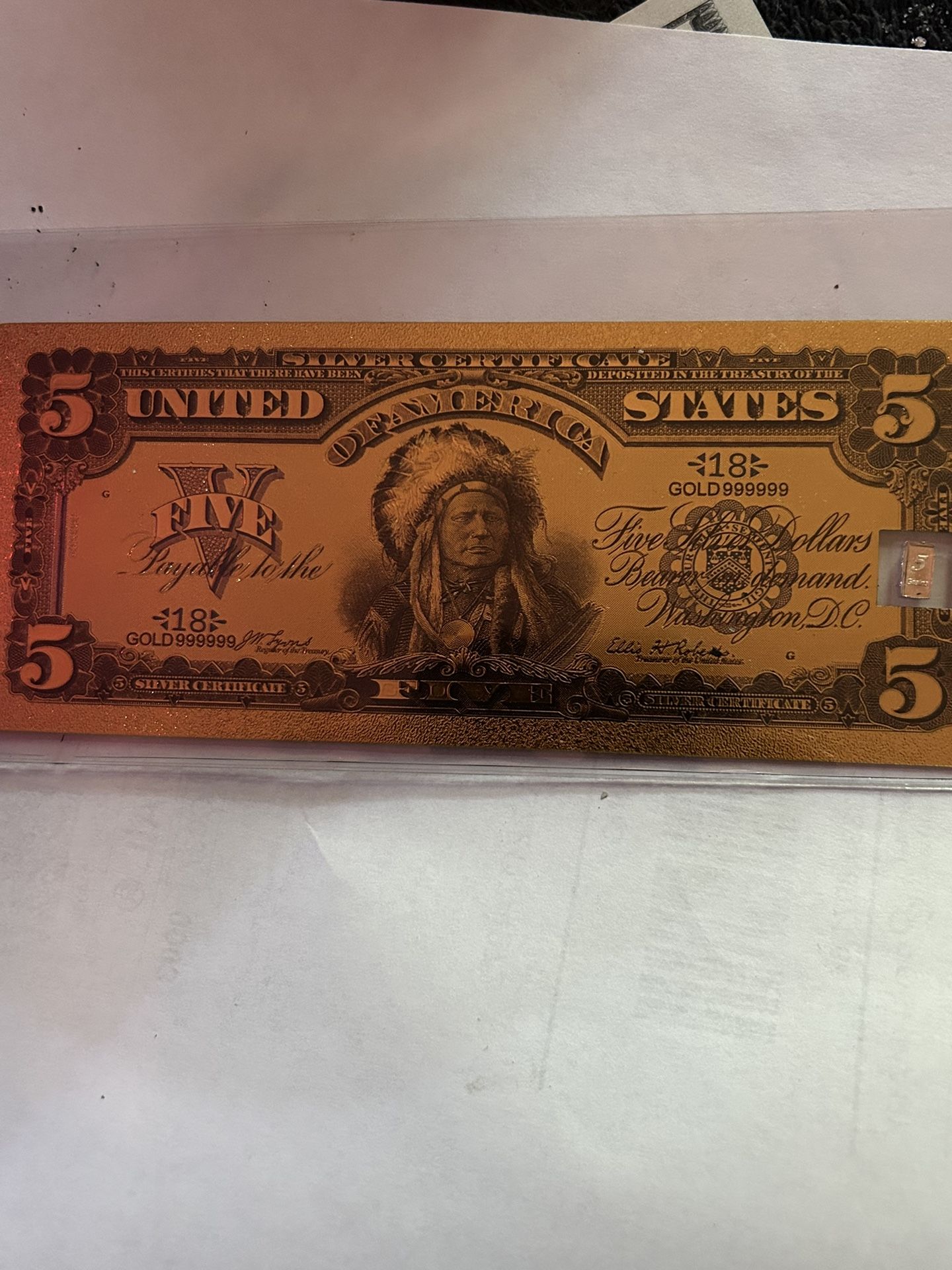4.5g of 24k gold plated bank note with 5 grains bar in the bank note