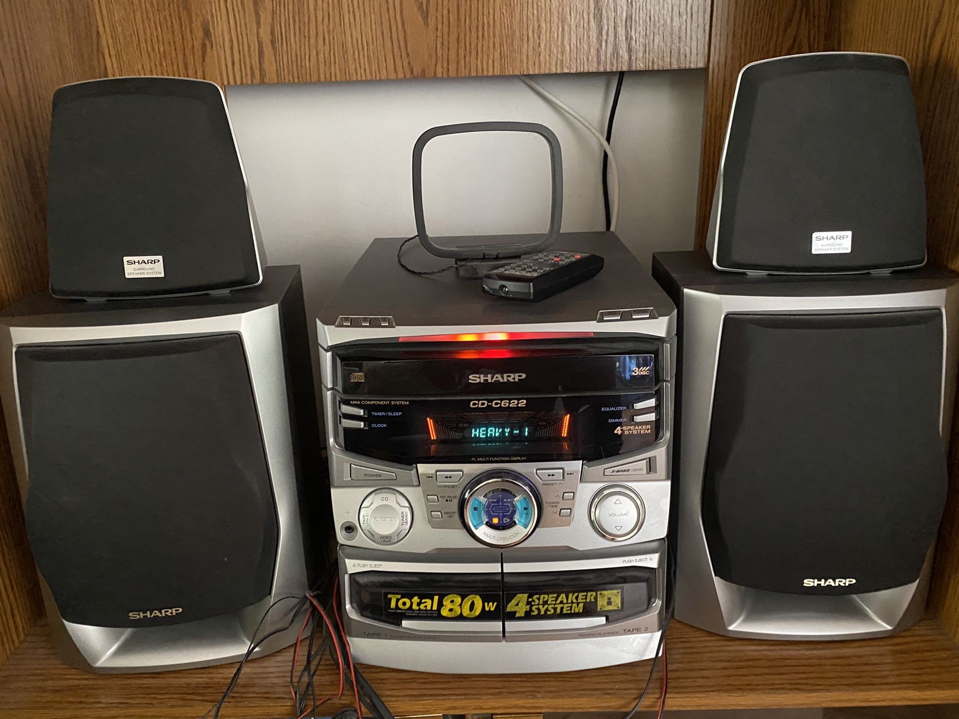 Sharp Stereo System 4 Speakers, Total 80 W. 3 CD Changer, 2 Cassette player, remote and antenna. AM/FM Radio.