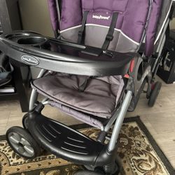 Purple And Grey Double Stroller