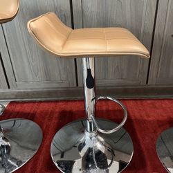 Swivel Adjustable Barstools Tan Beige Used- Fair $100 For A Total Of 3 Chairs 