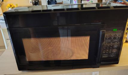 MAGIC CHEF 1.6 CU FT OVER THE RANGE MICROWAVE DELIVERY AVAILABLE