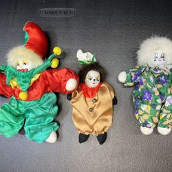 Set if Three 5 to 9 inch porcelain Faced Vintage Clowns