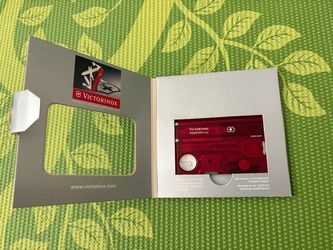 Brand New Victorinox Swiss Card Lite Rubin Transparent, Very Thin Swiss Card with 13 Functions, Sold in Amazon for $56, Kept in the closet, Never used