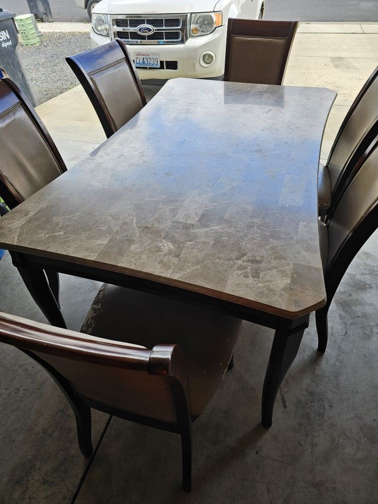 Table And 6 Chairs Table Its Marmol Good Condition Chairs A Litte Bad
