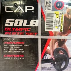 NIB Cap 50lb Olympic Plate set
