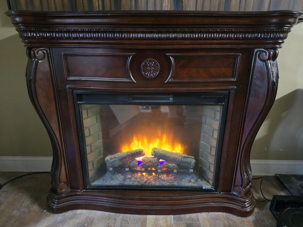All wood electric fireplace.